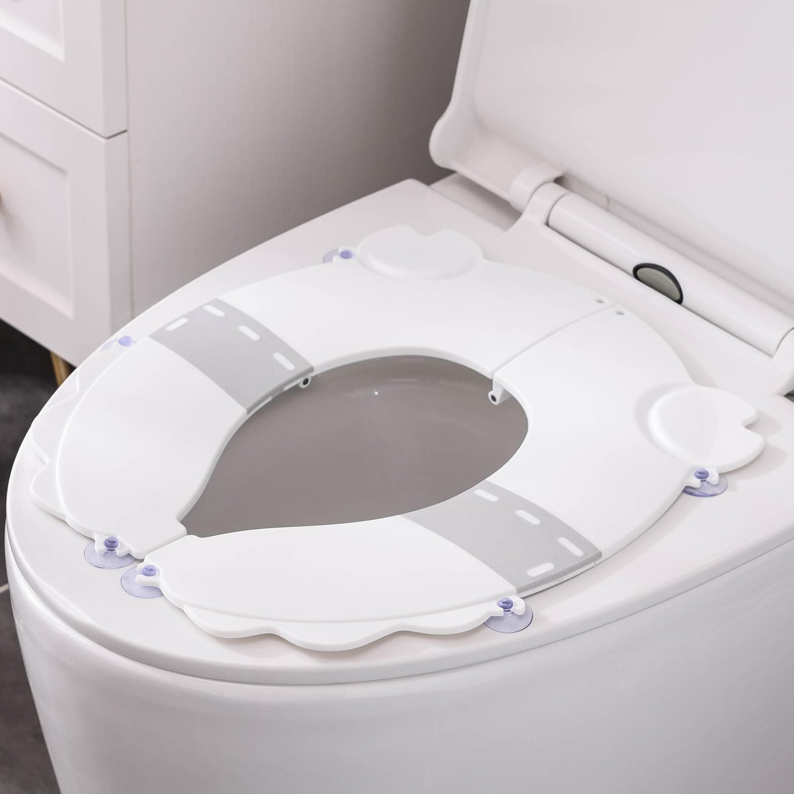 Portable Potty Training Seat，Upgraded Non-Slip-Anti pinch buttocks, One-handed Removal Folding Travel Potty Seat for Toddlers & Kids, 6 suction cups firmly adhere, Fits All Shape Toilets (White)